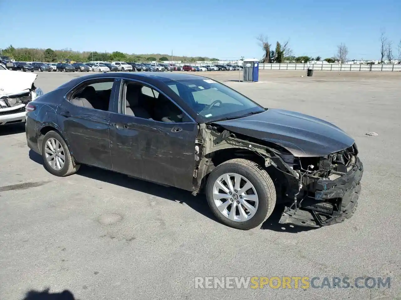 4 Photograph of a damaged car 4T1B11HK7KU809701 TOYOTA CAMRY 2019