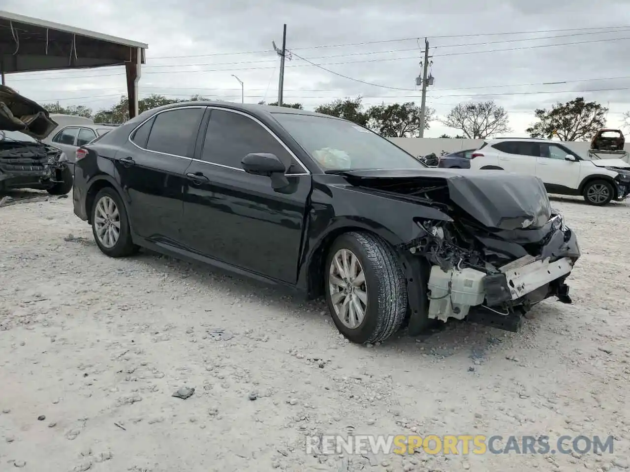 4 Photograph of a damaged car 4T1B11HK7KU810699 TOYOTA CAMRY 2019