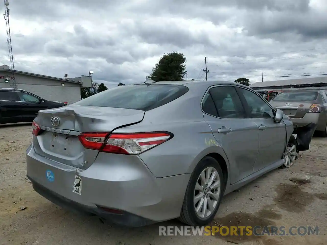 4 Photograph of a damaged car 4T1B11HK7KU811982 TOYOTA CAMRY 2019