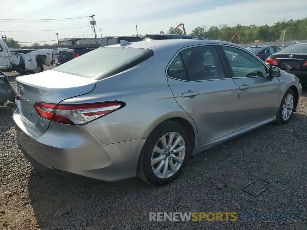 3 Photograph of a damaged car 4T1B11HK7KU812890 TOYOTA CAMRY 2019