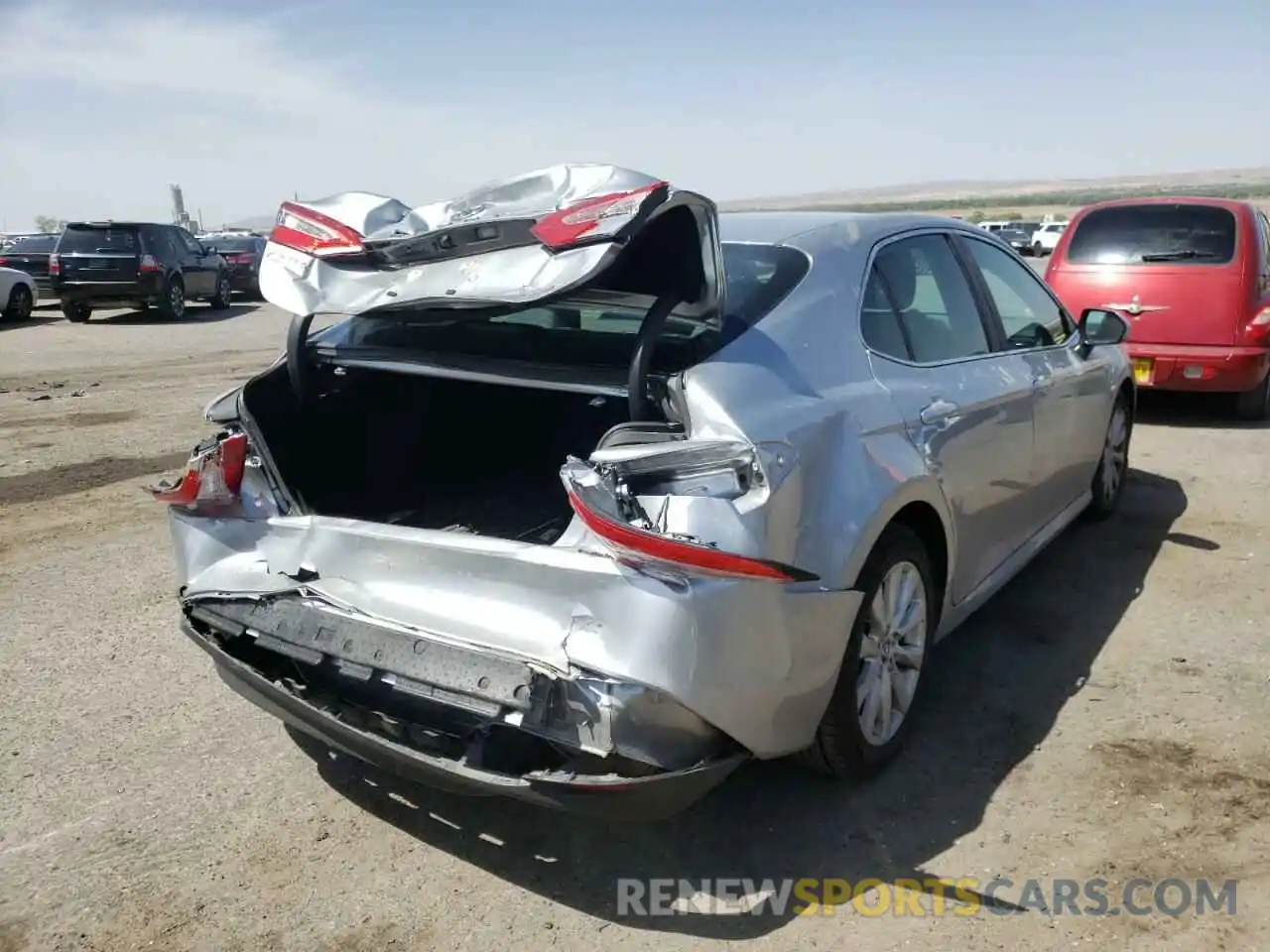 4 Photograph of a damaged car 4T1B11HK7KU814039 TOYOTA CAMRY 2019