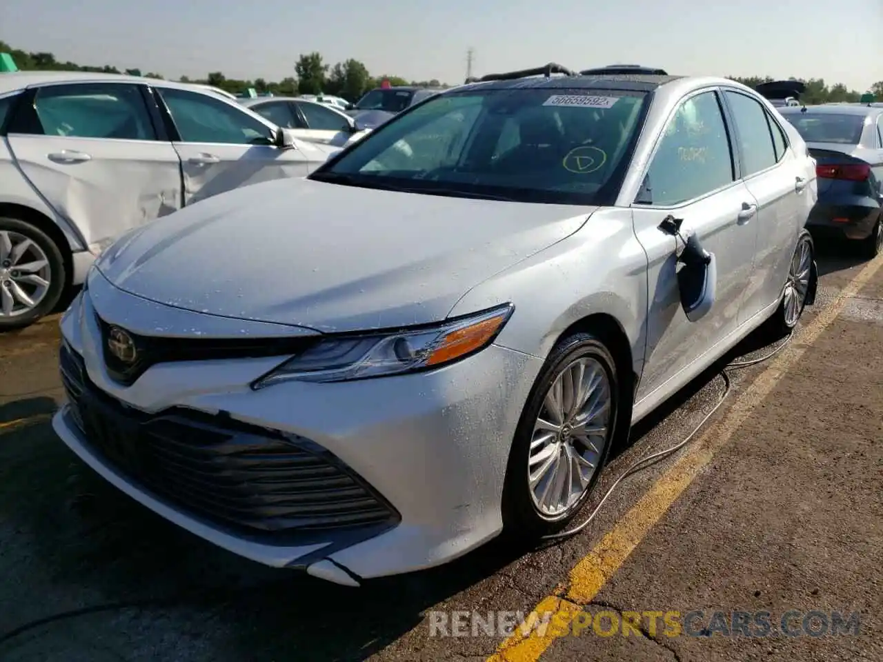 2 Photograph of a damaged car 4T1B11HK7KU814574 TOYOTA CAMRY 2019