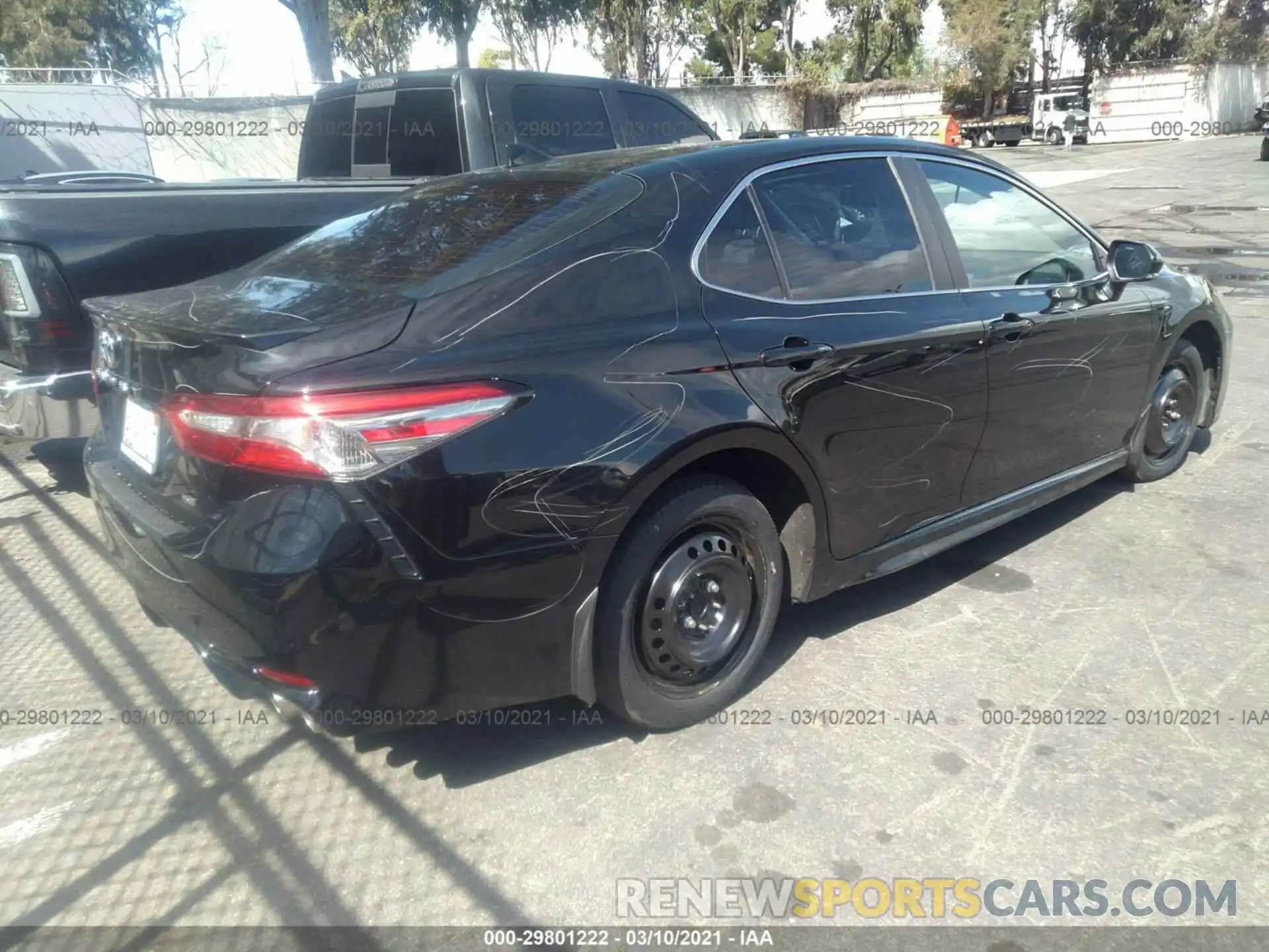 4 Photograph of a damaged car 4T1B11HK7KU824974 TOYOTA CAMRY 2019