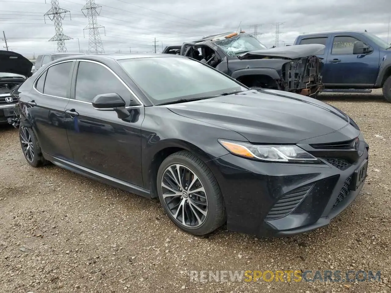 4 Photograph of a damaged car 4T1B11HK7KU826529 TOYOTA CAMRY 2019