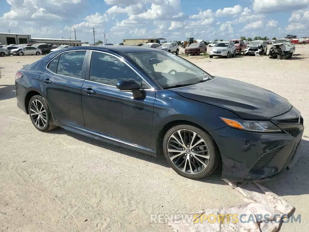 4 Photograph of a damaged car 4T1B11HK7KU827857 TOYOTA CAMRY 2019