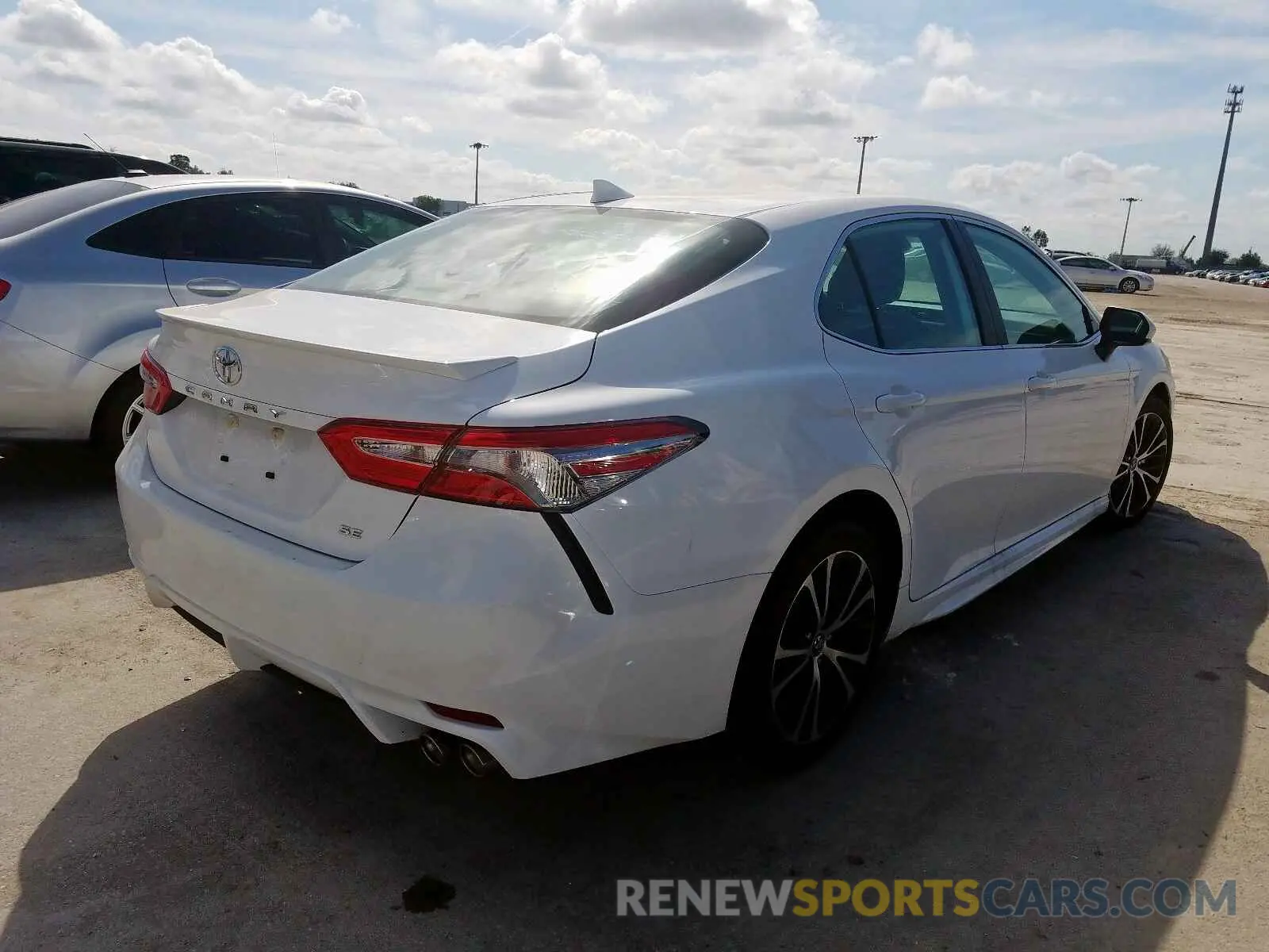4 Photograph of a damaged car 4T1B11HK7KU831861 TOYOTA CAMRY 2019