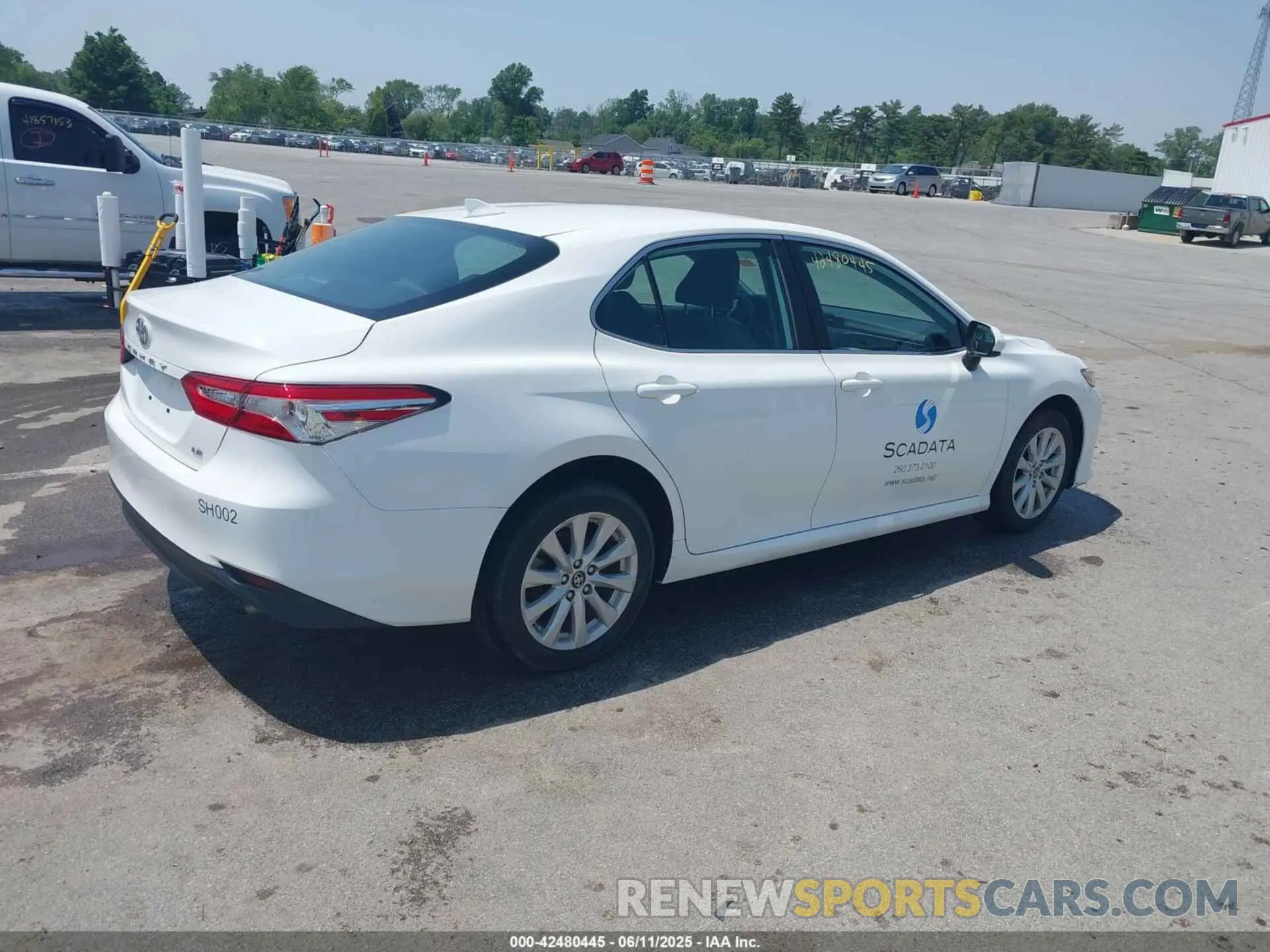 4 Photograph of a damaged car 4T1B11HK7KU853374 TOYOTA CAMRY 2019