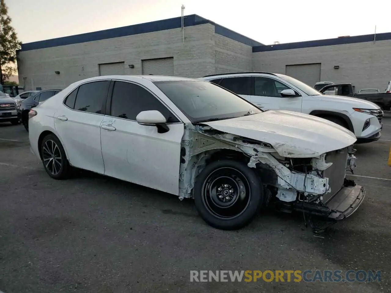 4 Photograph of a damaged car 4T1B11HK8KU172799 TOYOTA CAMRY 2019