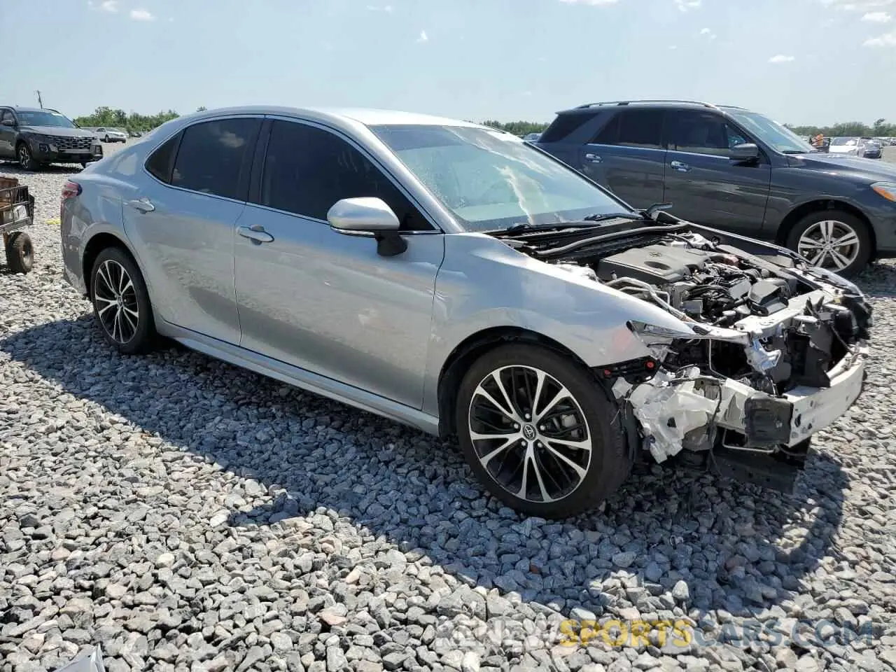 4 Photograph of a damaged car 4T1B11HK8KU209995 TOYOTA CAMRY 2019
