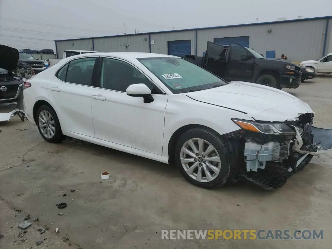 4 Photograph of a damaged car 4T1B11HK8KU239174 TOYOTA CAMRY 2019