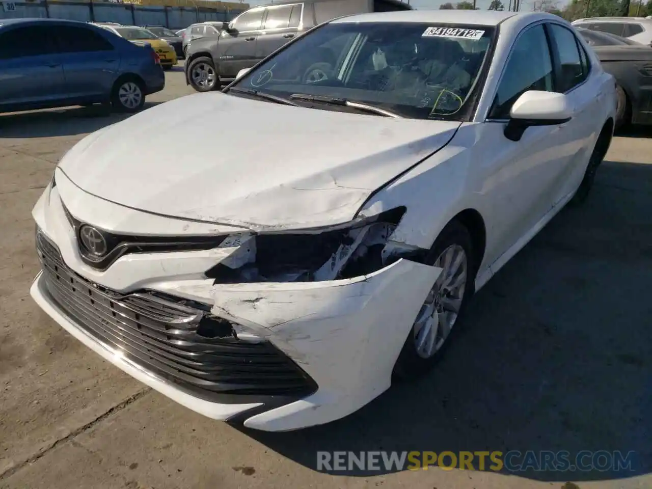 2 Photograph of a damaged car 4T1B11HK8KU254323 TOYOTA CAMRY 2019