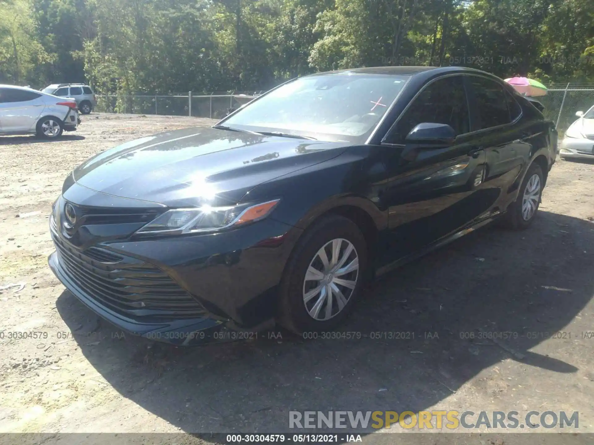 2 Photograph of a damaged car 4T1B11HK8KU712345 TOYOTA CAMRY 2019