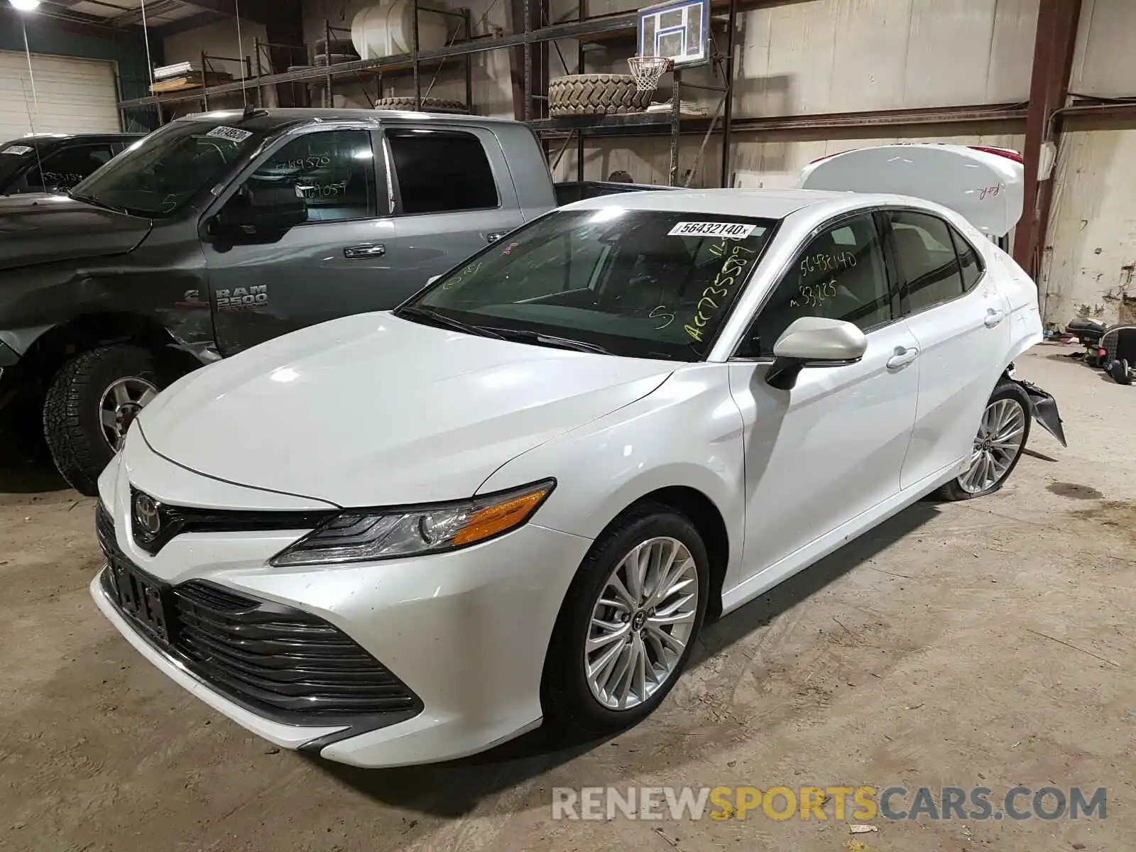 2 Photograph of a damaged car 4T1B11HK8KU735589 TOYOTA CAMRY 2019