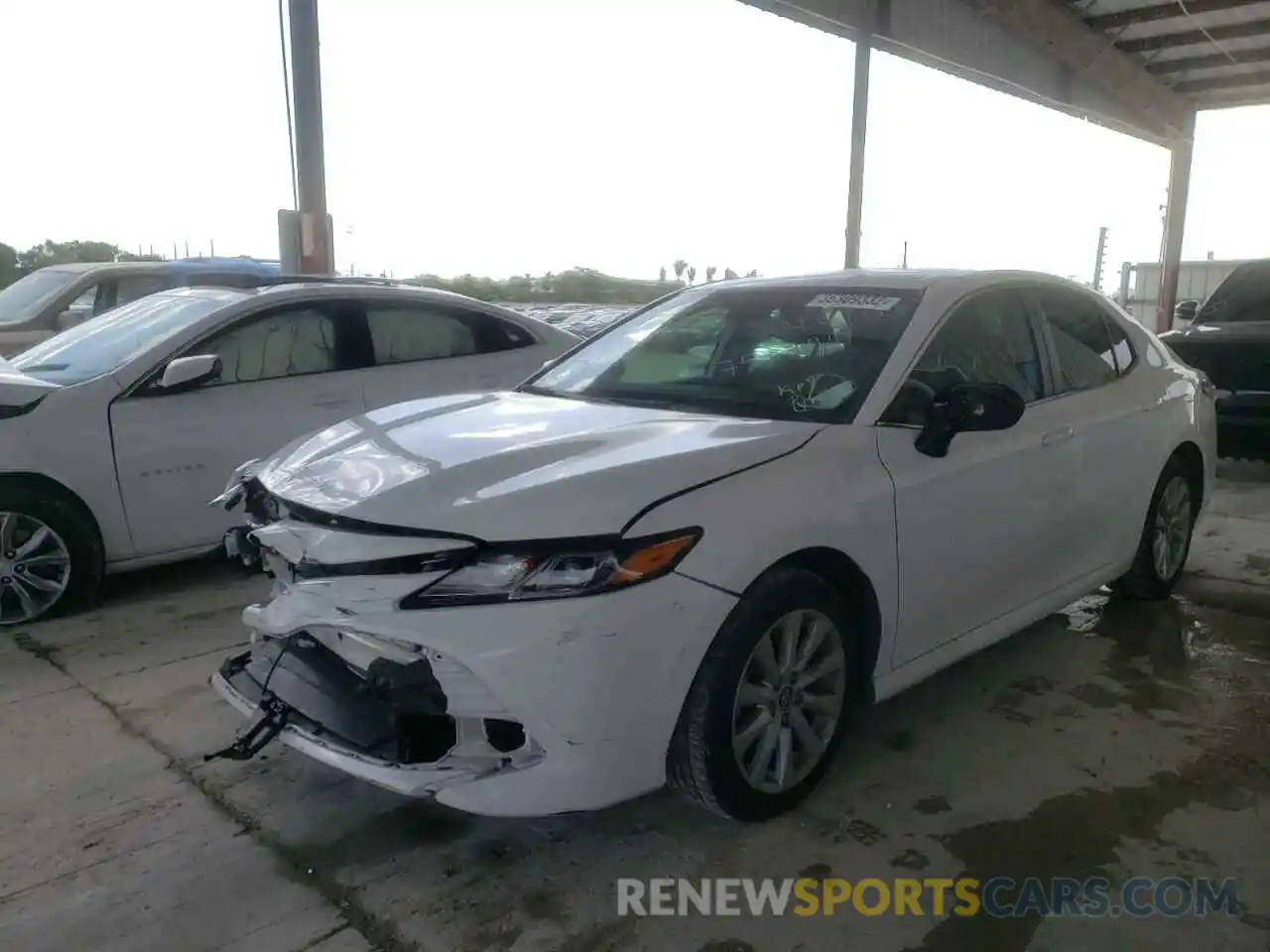 2 Photograph of a damaged car 4T1B11HK8KU752294 TOYOTA CAMRY 2019