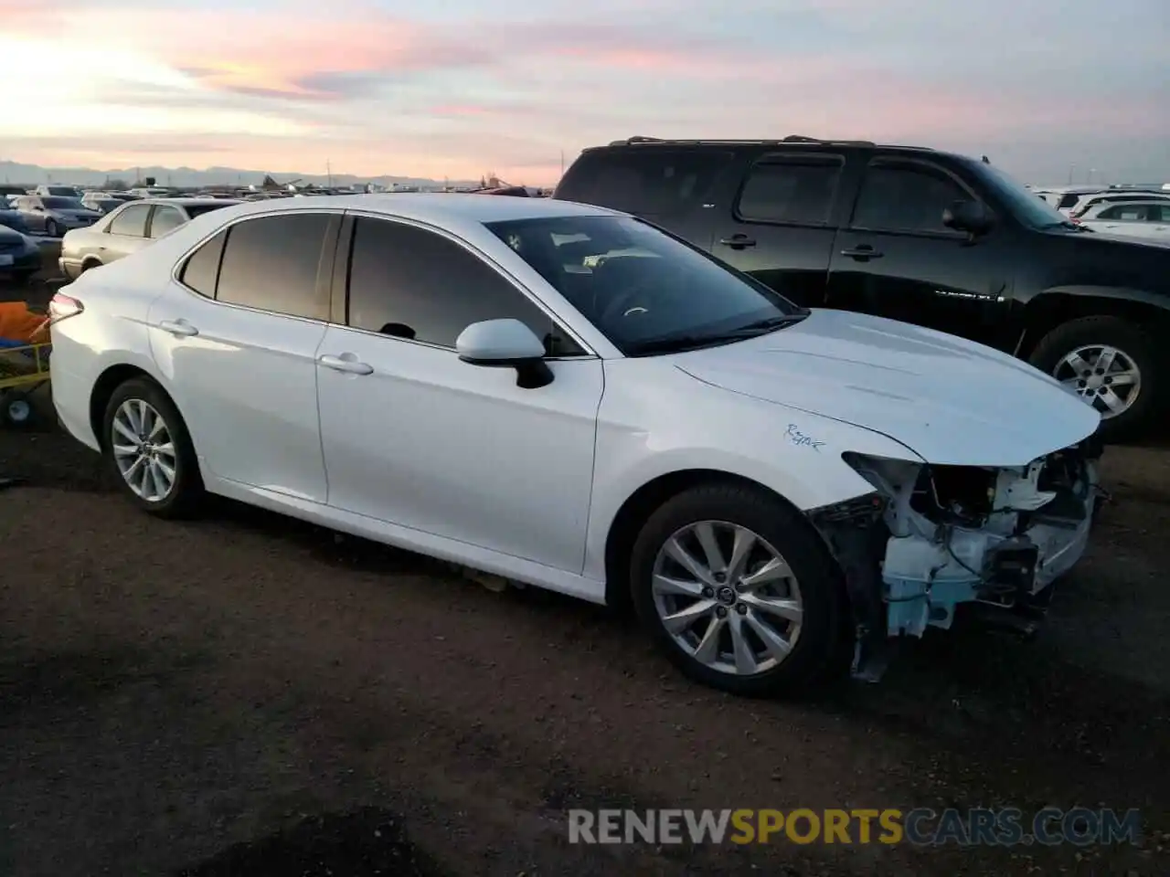 4 Photograph of a damaged car 4T1B11HK8KU801929 TOYOTA CAMRY 2019