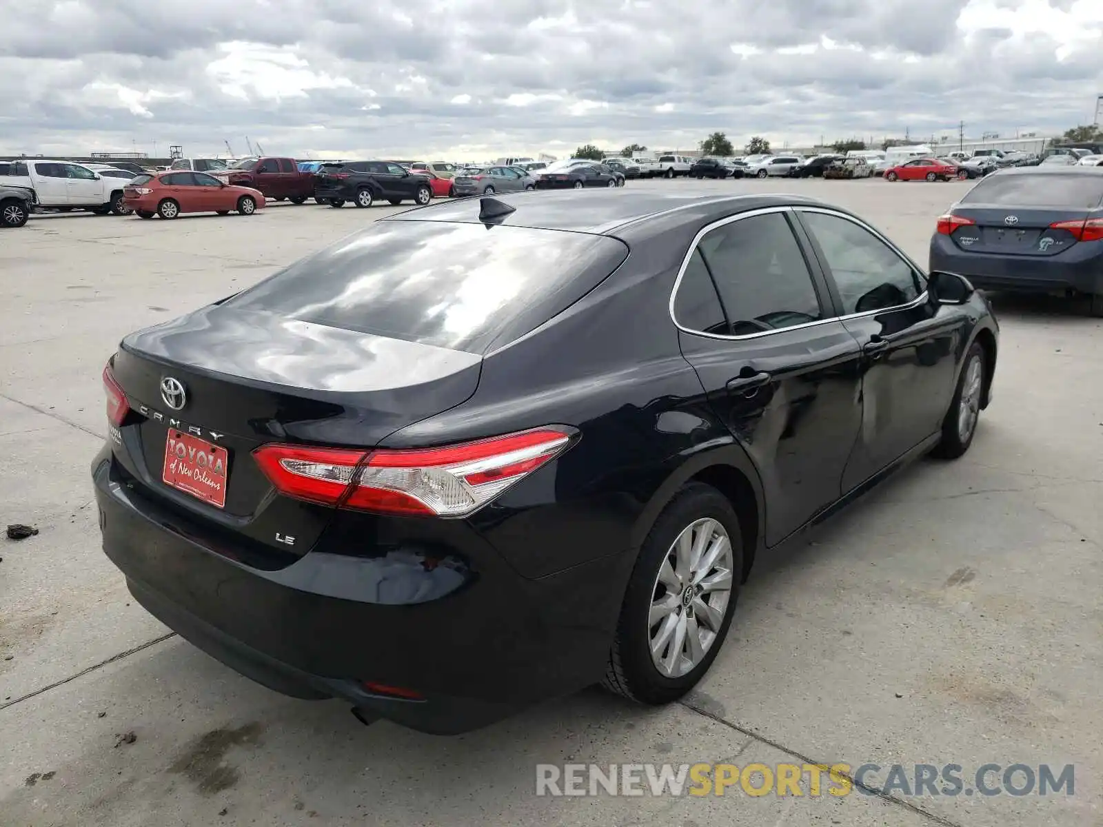 4 Photograph of a damaged car 4T1B11HK8KU813207 TOYOTA CAMRY 2019