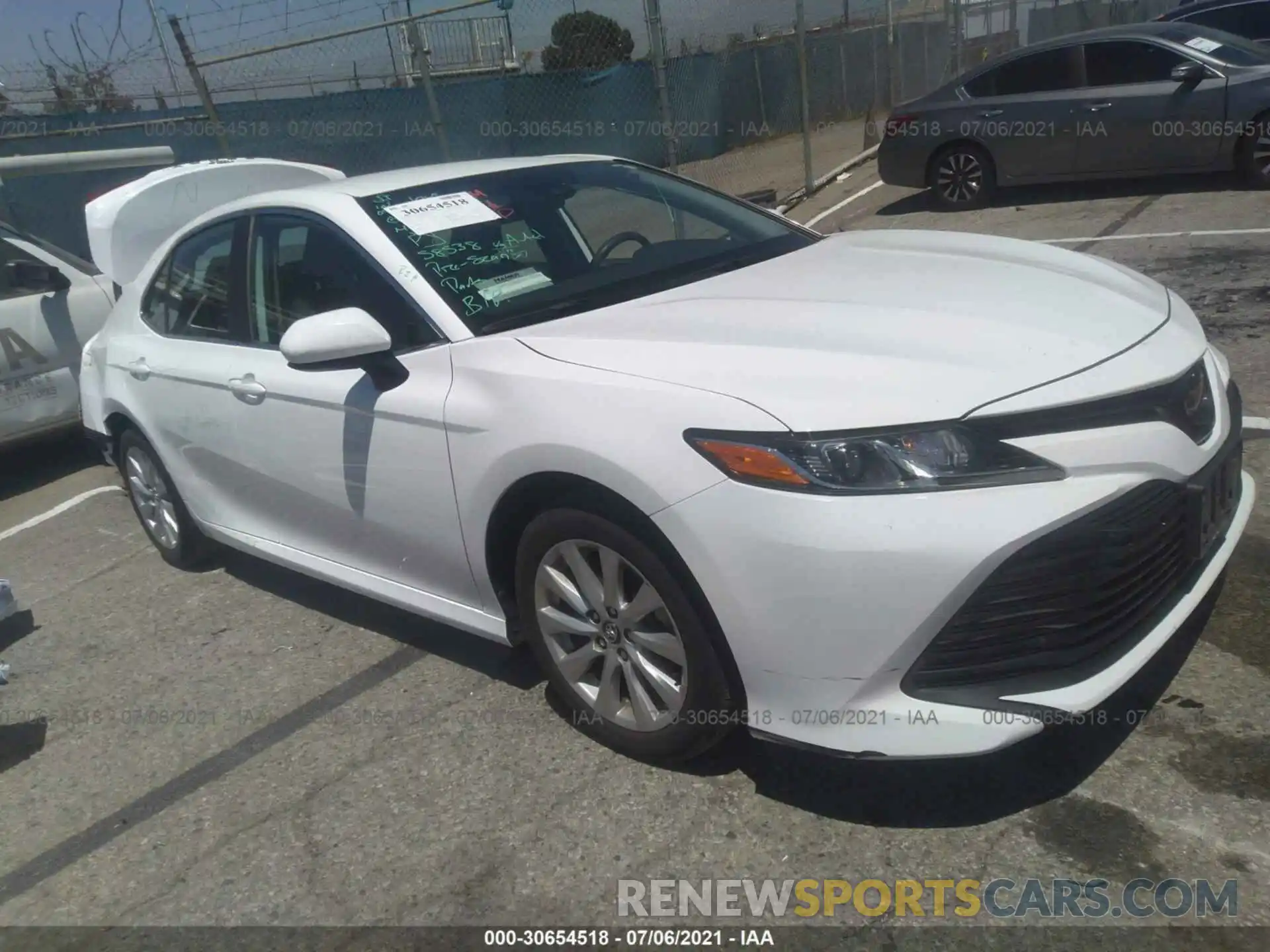 1 Photograph of a damaged car 4T1B11HK8KU832839 TOYOTA CAMRY 2019