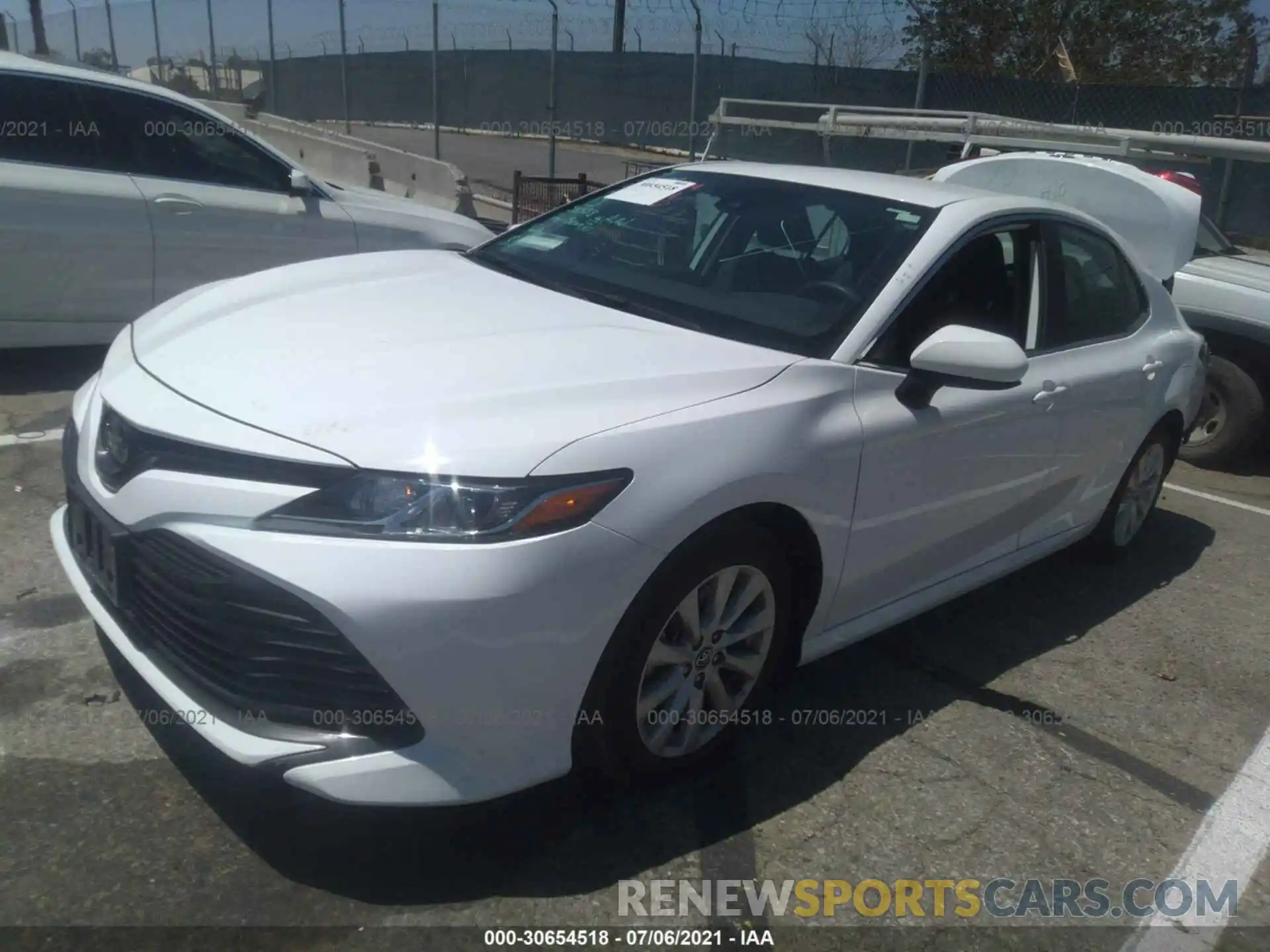 2 Photograph of a damaged car 4T1B11HK8KU832839 TOYOTA CAMRY 2019