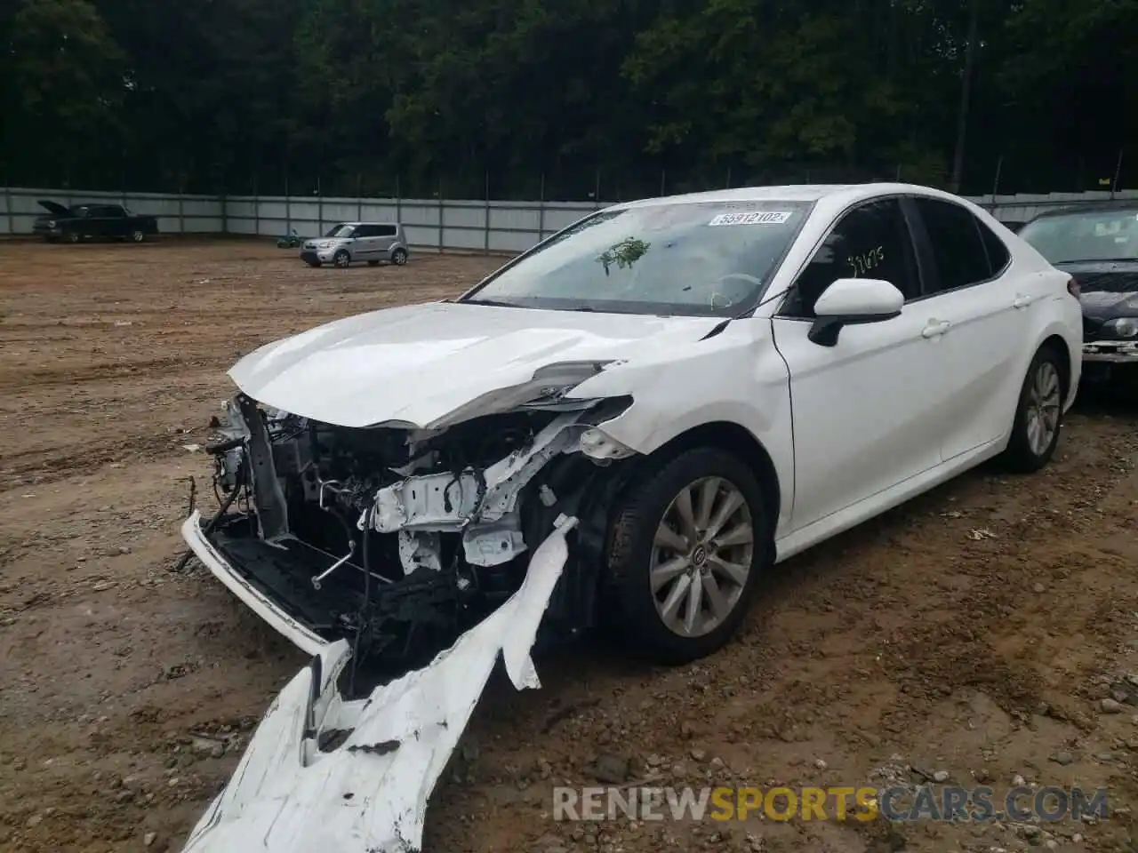 2 Photograph of a damaged car 4T1B11HK9KU178594 TOYOTA CAMRY 2019