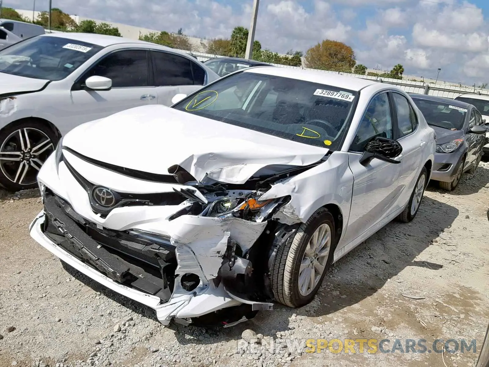 2 Photograph of a damaged car 4T1B11HK9KU197226 TOYOTA CAMRY 2019