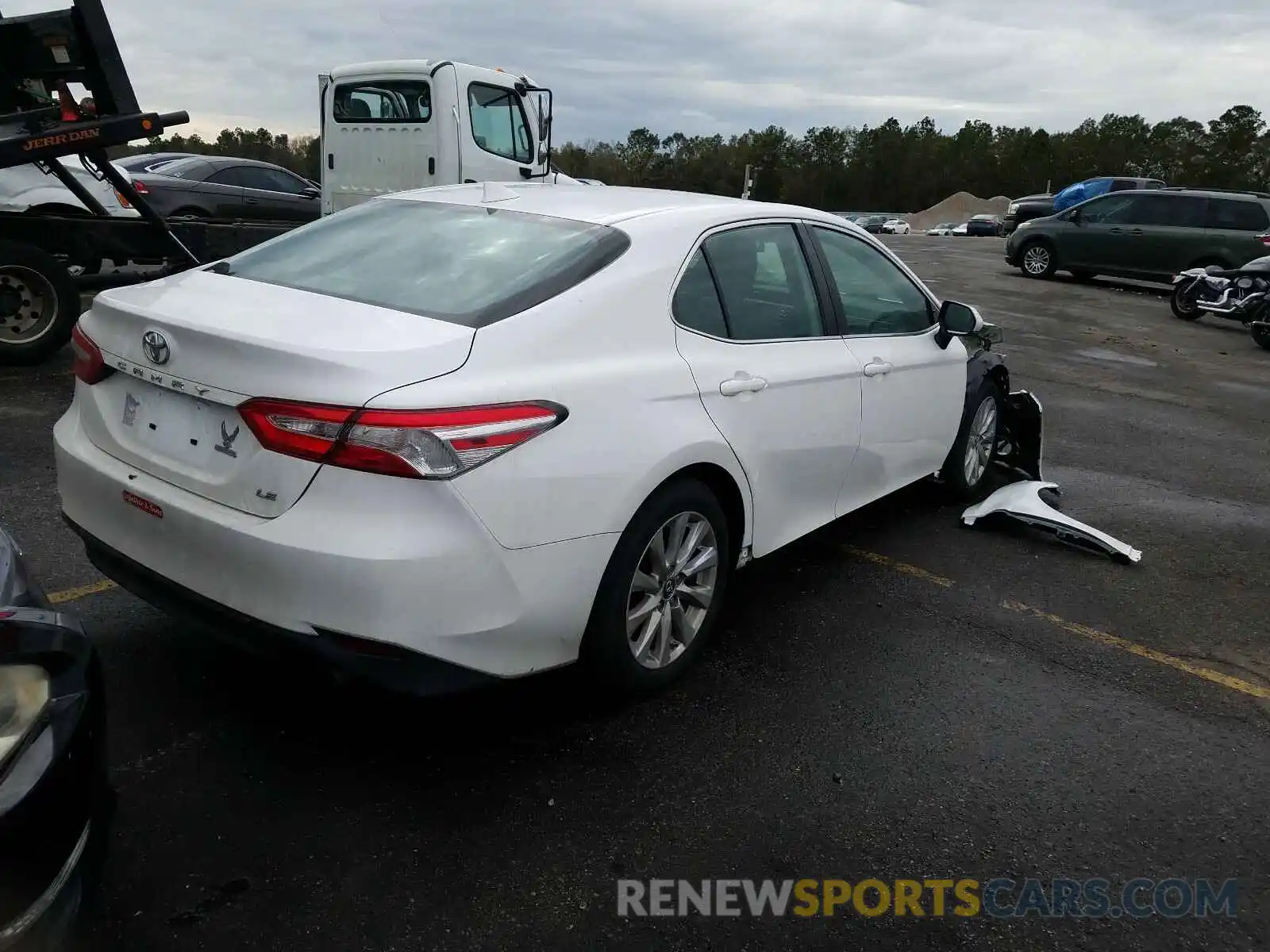 4 Photograph of a damaged car 4T1B11HK9KU213215 TOYOTA CAMRY 2019