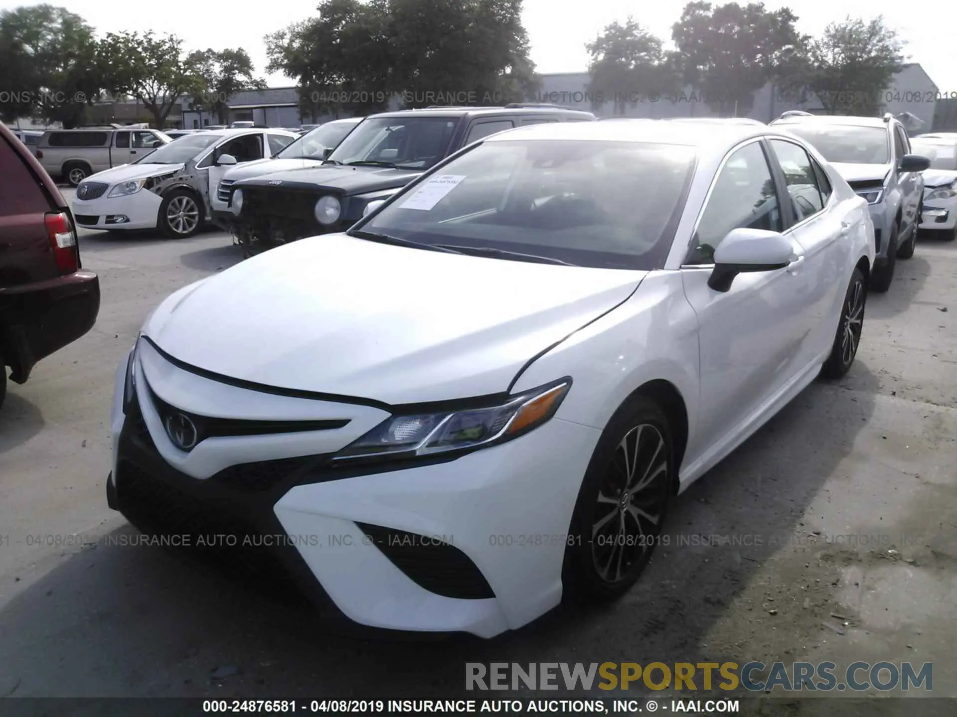2 Photograph of a damaged car 4T1B11HK9KU225719 TOYOTA CAMRY 2019