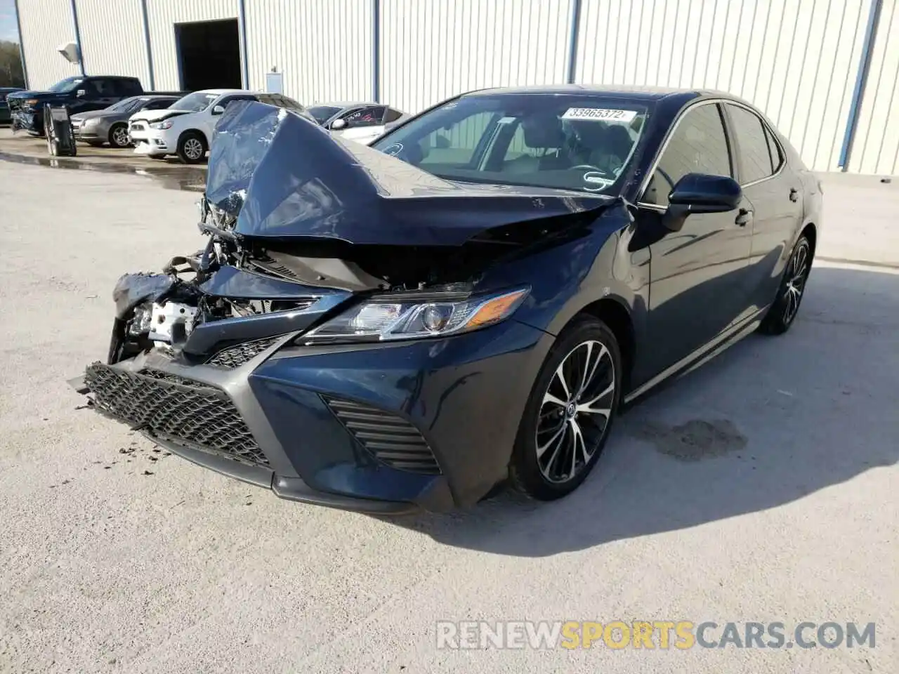 2 Photograph of a damaged car 4T1B11HK9KU260275 TOYOTA CAMRY 2019