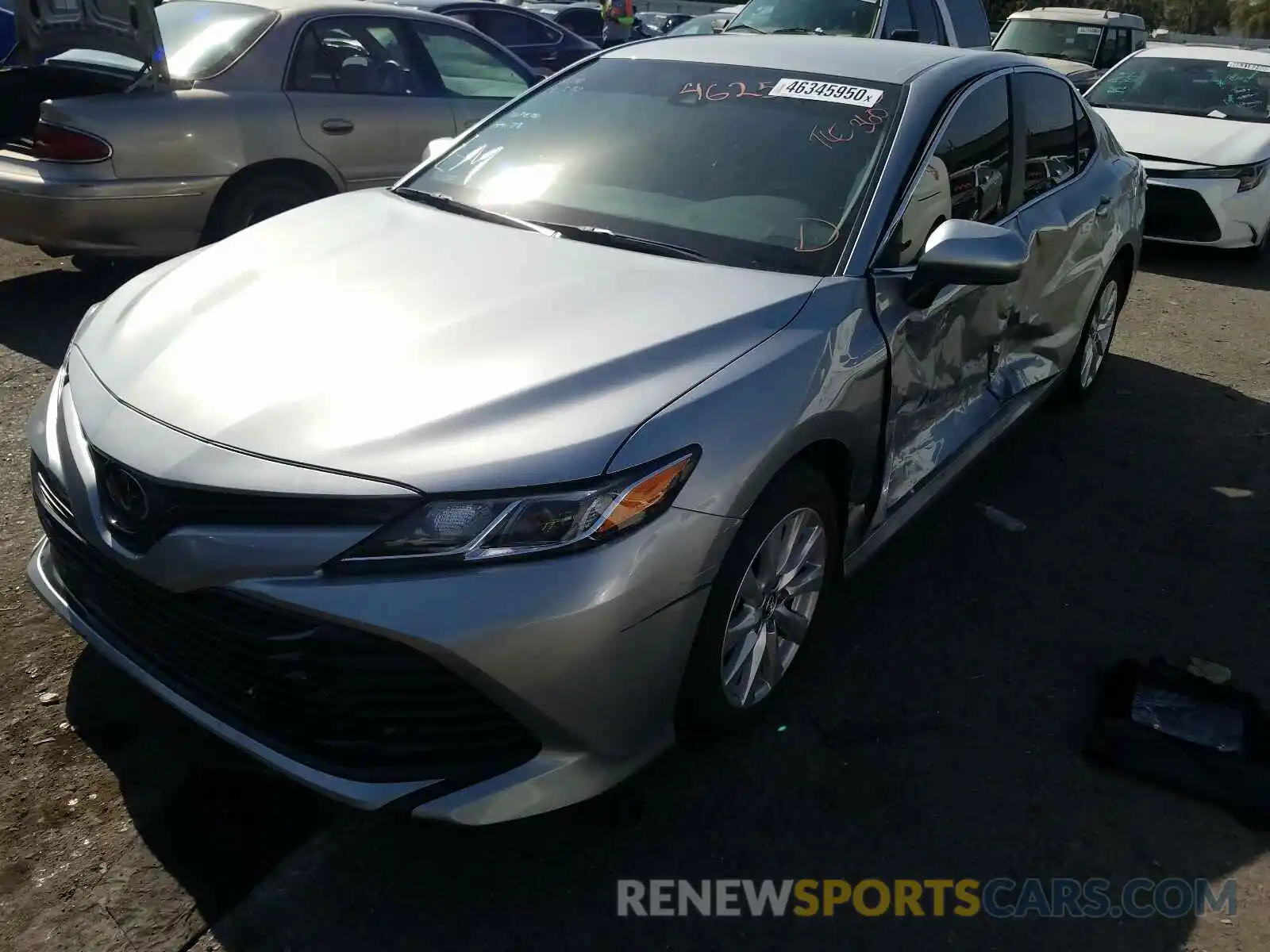 2 Photograph of a damaged car 4T1B11HK9KU266593 TOYOTA CAMRY 2019