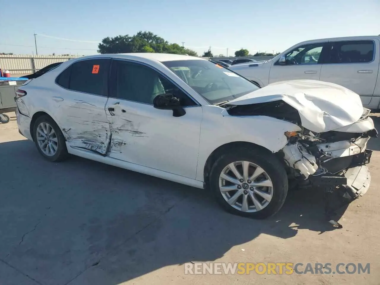 4 Photograph of a damaged car 4T1B11HK9KU267193 TOYOTA CAMRY 2019