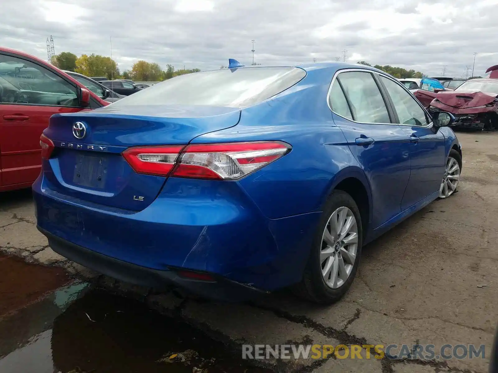 4 Photograph of a damaged car 4T1B11HK9KU267887 TOYOTA CAMRY 2019