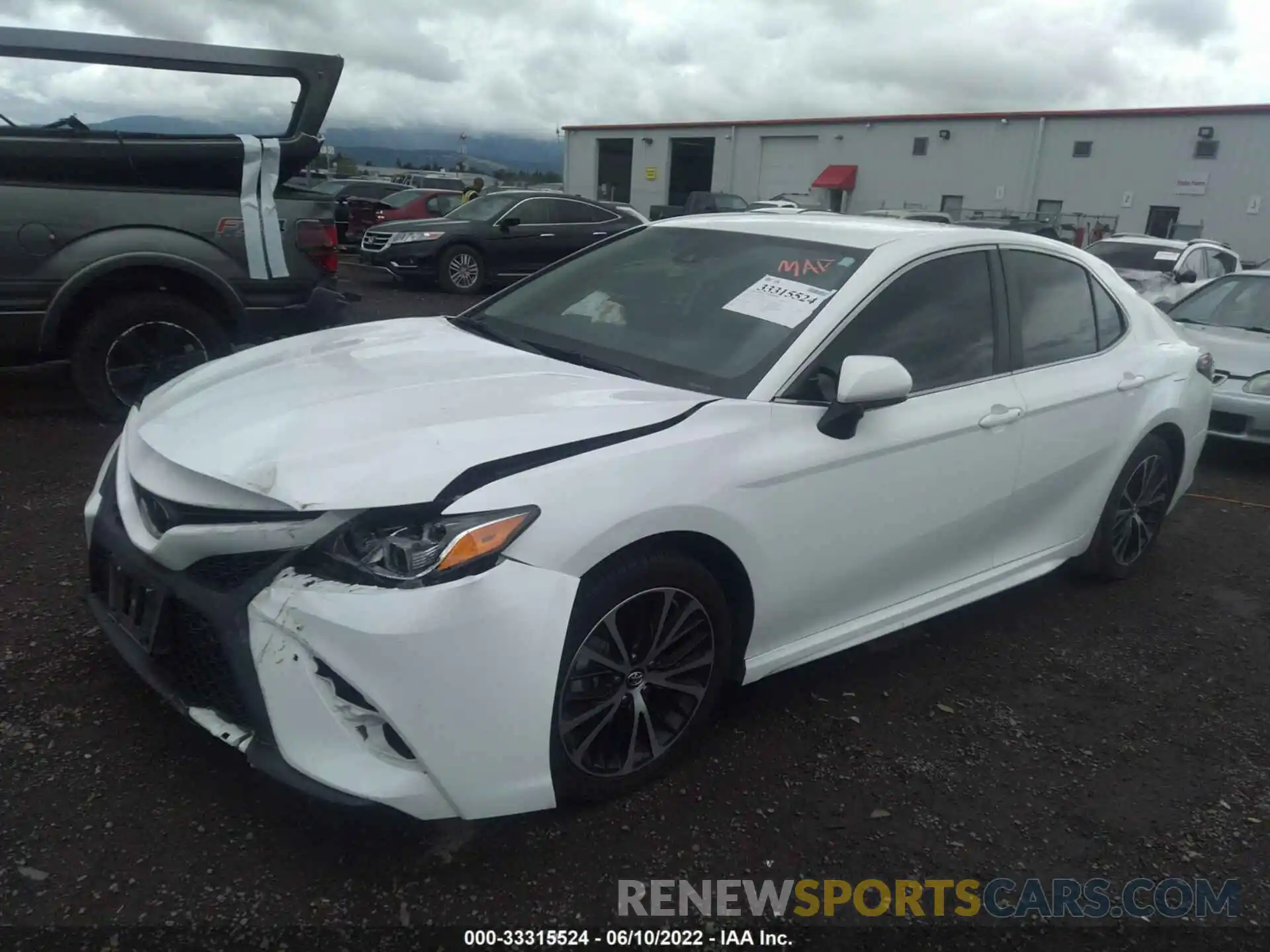 2 Photograph of a damaged car 4T1B11HK9KU273706 TOYOTA CAMRY 2019