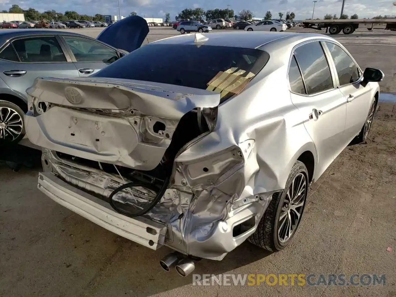 4 Photograph of a damaged car 4T1B11HK9KU281174 TOYOTA CAMRY 2019