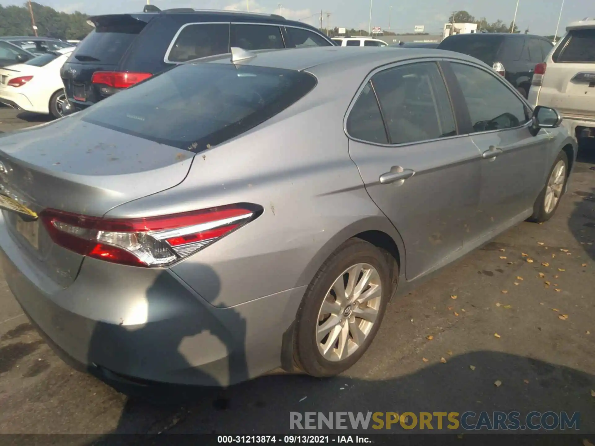 4 Photograph of a damaged car 4T1B11HK9KU285032 TOYOTA CAMRY 2019