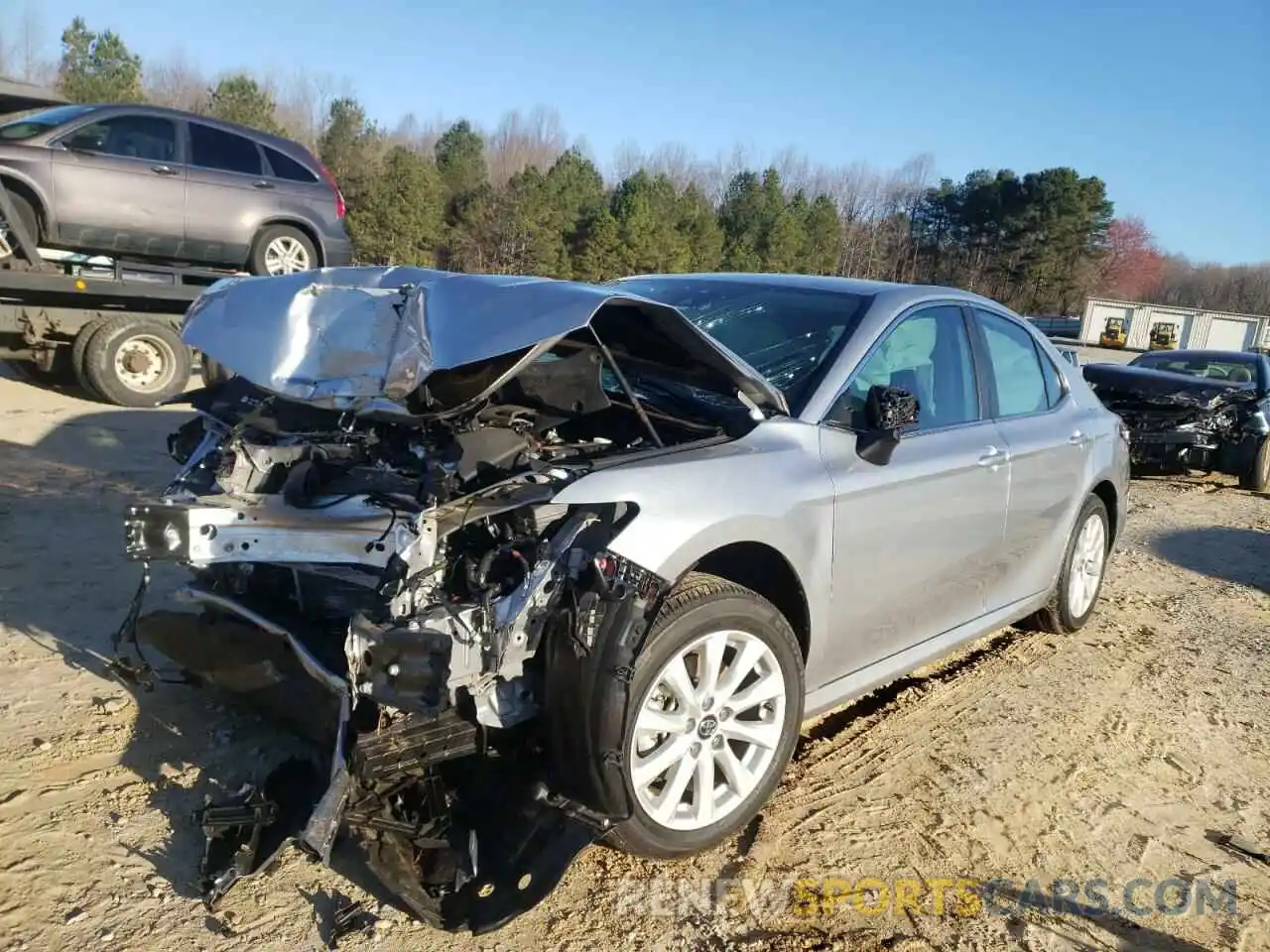 2 Photograph of a damaged car 4T1B11HK9KU286956 TOYOTA CAMRY 2019