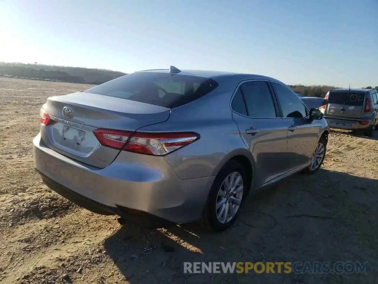 4 Photograph of a damaged car 4T1B11HK9KU286956 TOYOTA CAMRY 2019