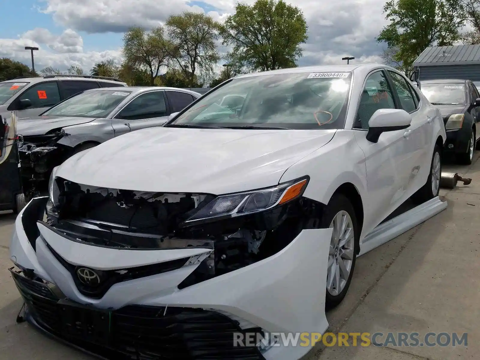 2 Photograph of a damaged car 4T1B11HK9KU290182 TOYOTA CAMRY 2019