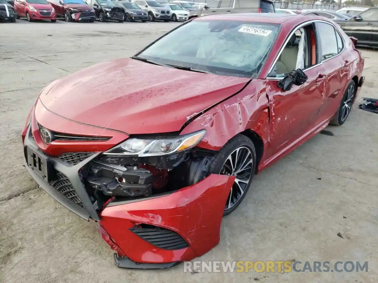 2 Photograph of a damaged car 4T1B11HK9KU295706 TOYOTA CAMRY 2019