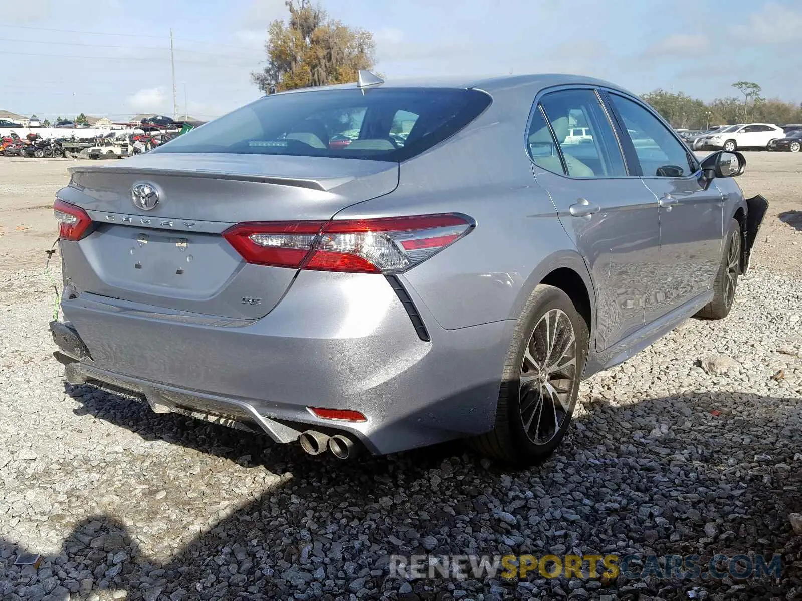4 Photograph of a damaged car 4T1B11HK9KU689982 TOYOTA CAMRY 2019