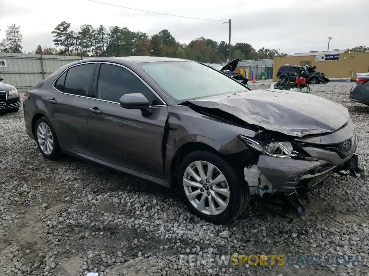 4 Photograph of a damaged car 4T1B11HK9KU695233 TOYOTA CAMRY 2019
