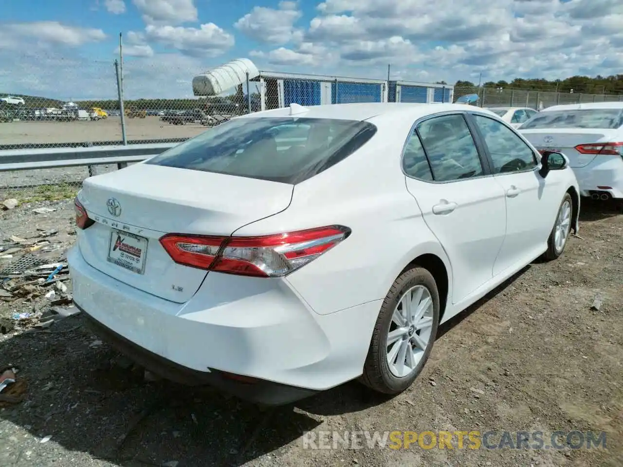 4 Photograph of a damaged car 4T1B11HK9KU701418 TOYOTA CAMRY 2019