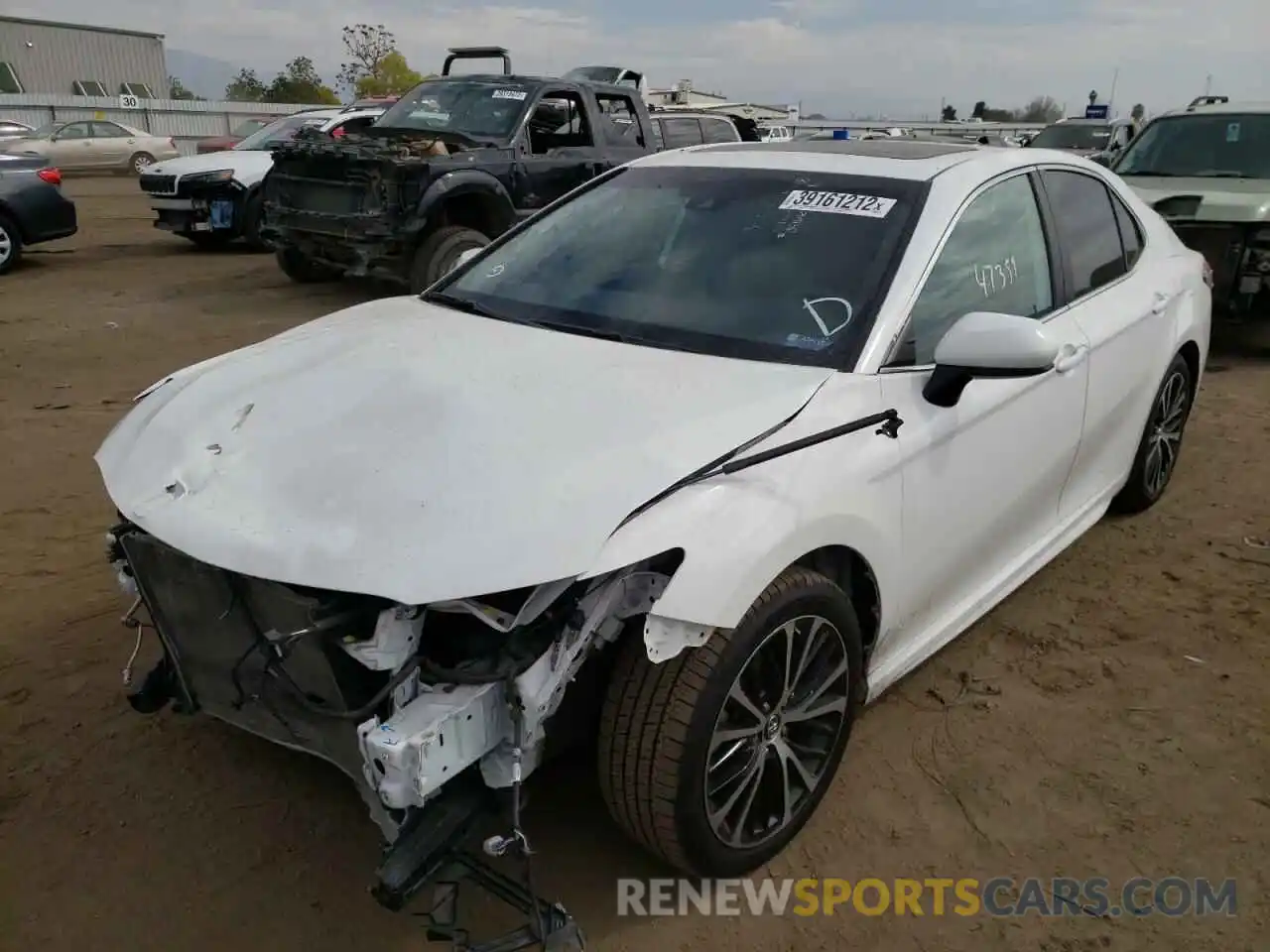 2 Photograph of a damaged car 4T1B11HK9KU707610 TOYOTA CAMRY 2019