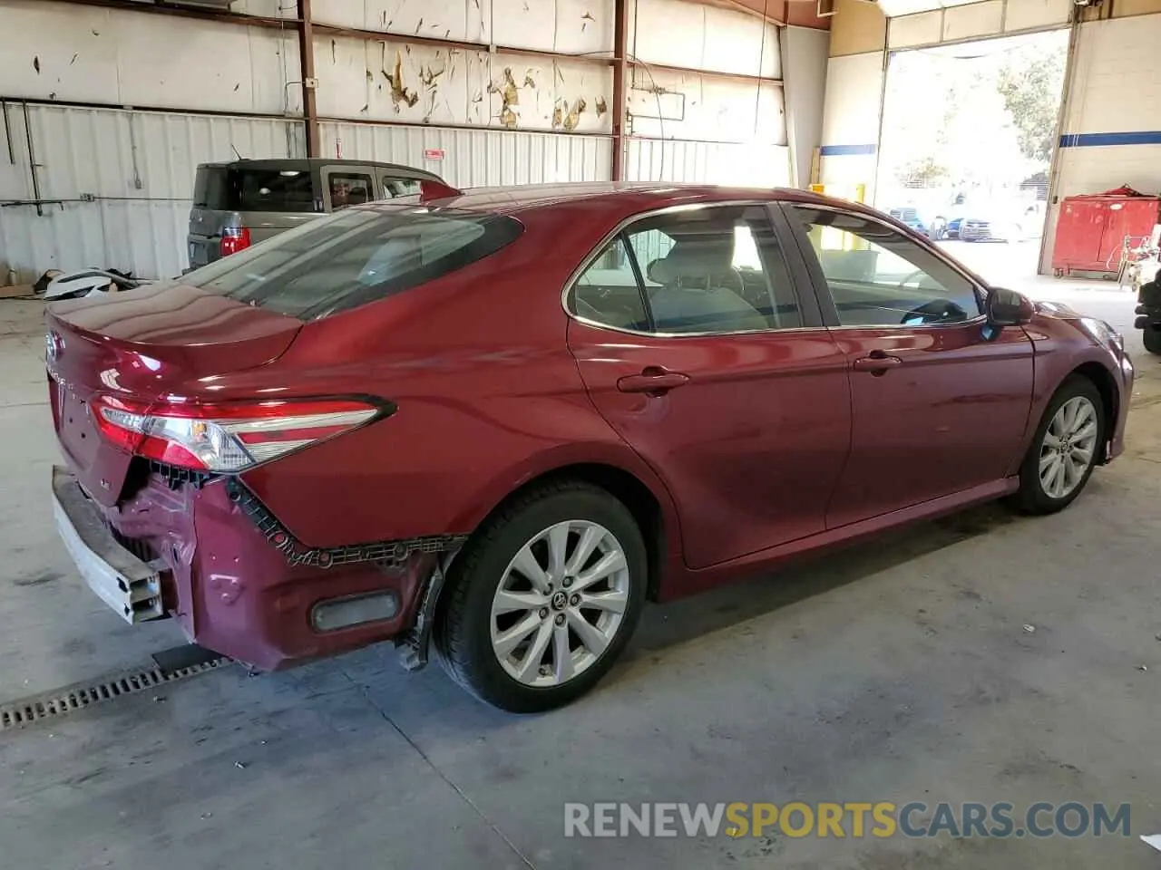 3 Photograph of a damaged car 4T1B11HK9KU712953 TOYOTA CAMRY 2019