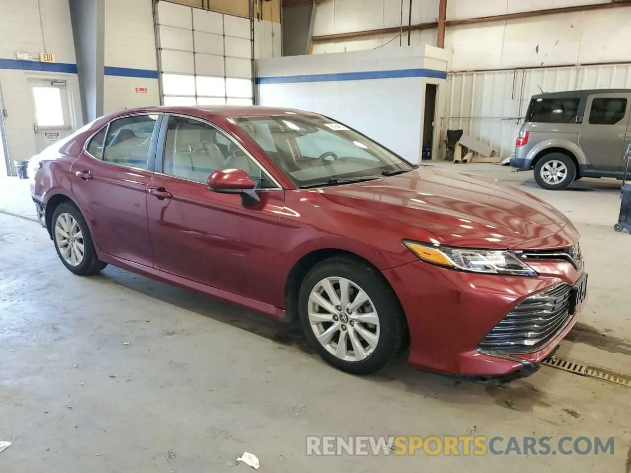 4 Photograph of a damaged car 4T1B11HK9KU712953 TOYOTA CAMRY 2019