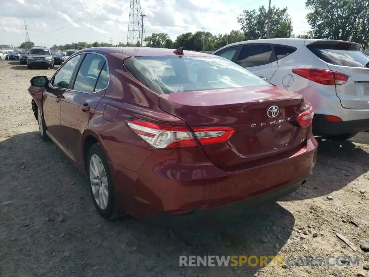 3 Photograph of a damaged car 4T1B11HK9KU715299 TOYOTA CAMRY 2019