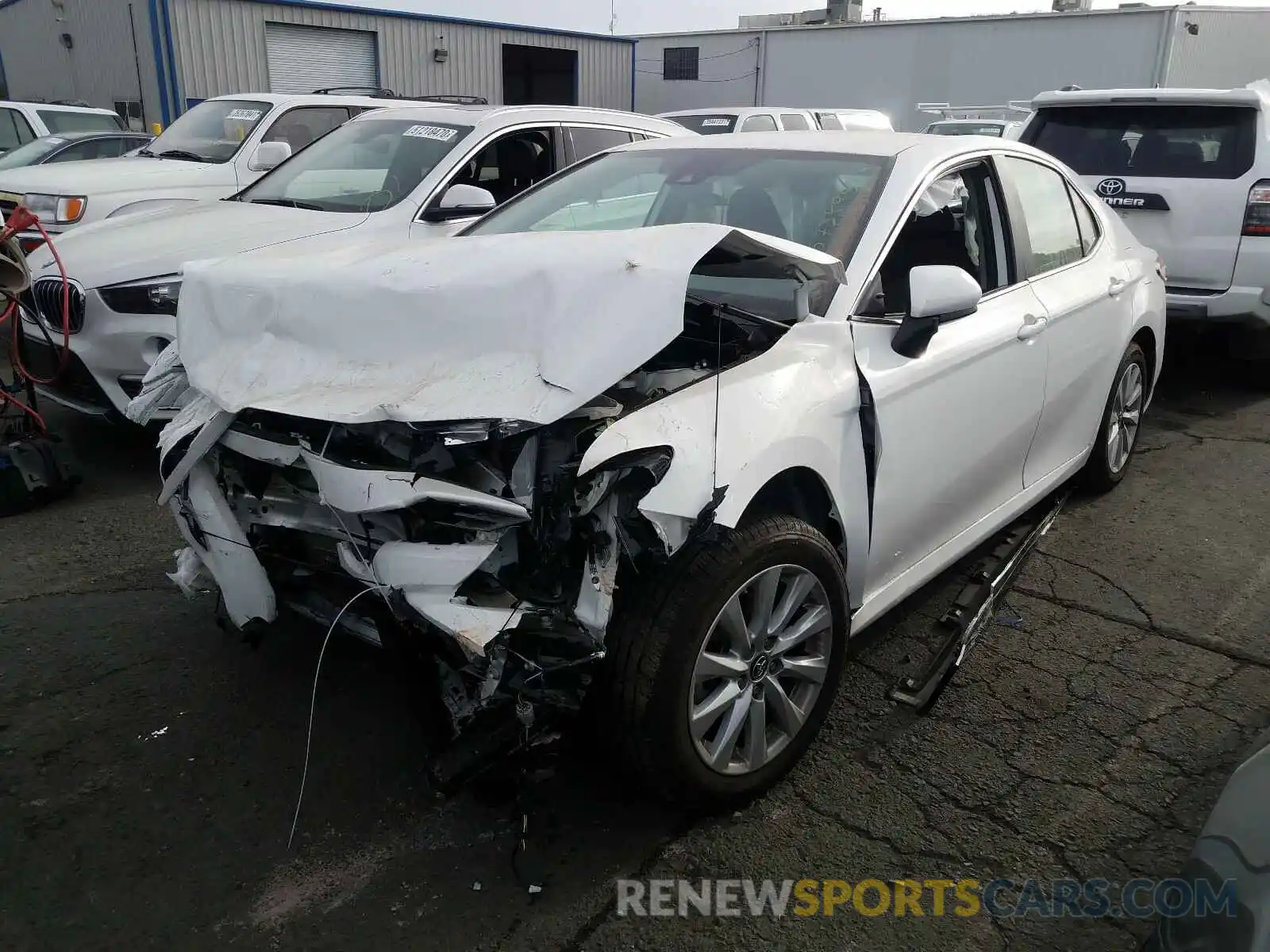 2 Photograph of a damaged car 4T1B11HK9KU720552 TOYOTA CAMRY 2019