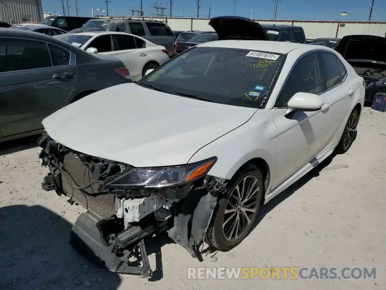 2 Photograph of a damaged car 4T1B11HK9KU721085 TOYOTA CAMRY 2019