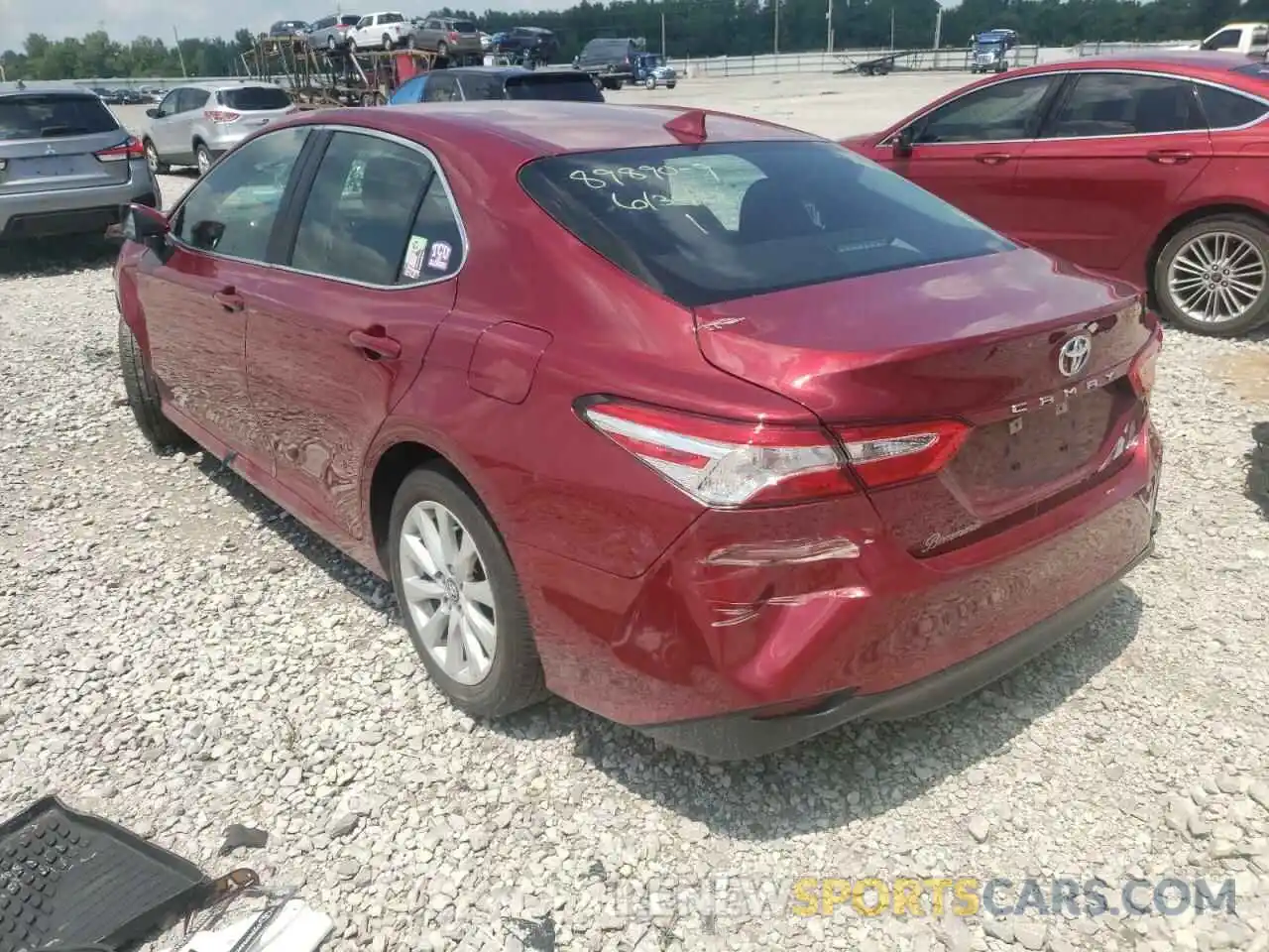 3 Photograph of a damaged car 4T1B11HK9KU737769 TOYOTA CAMRY 2019