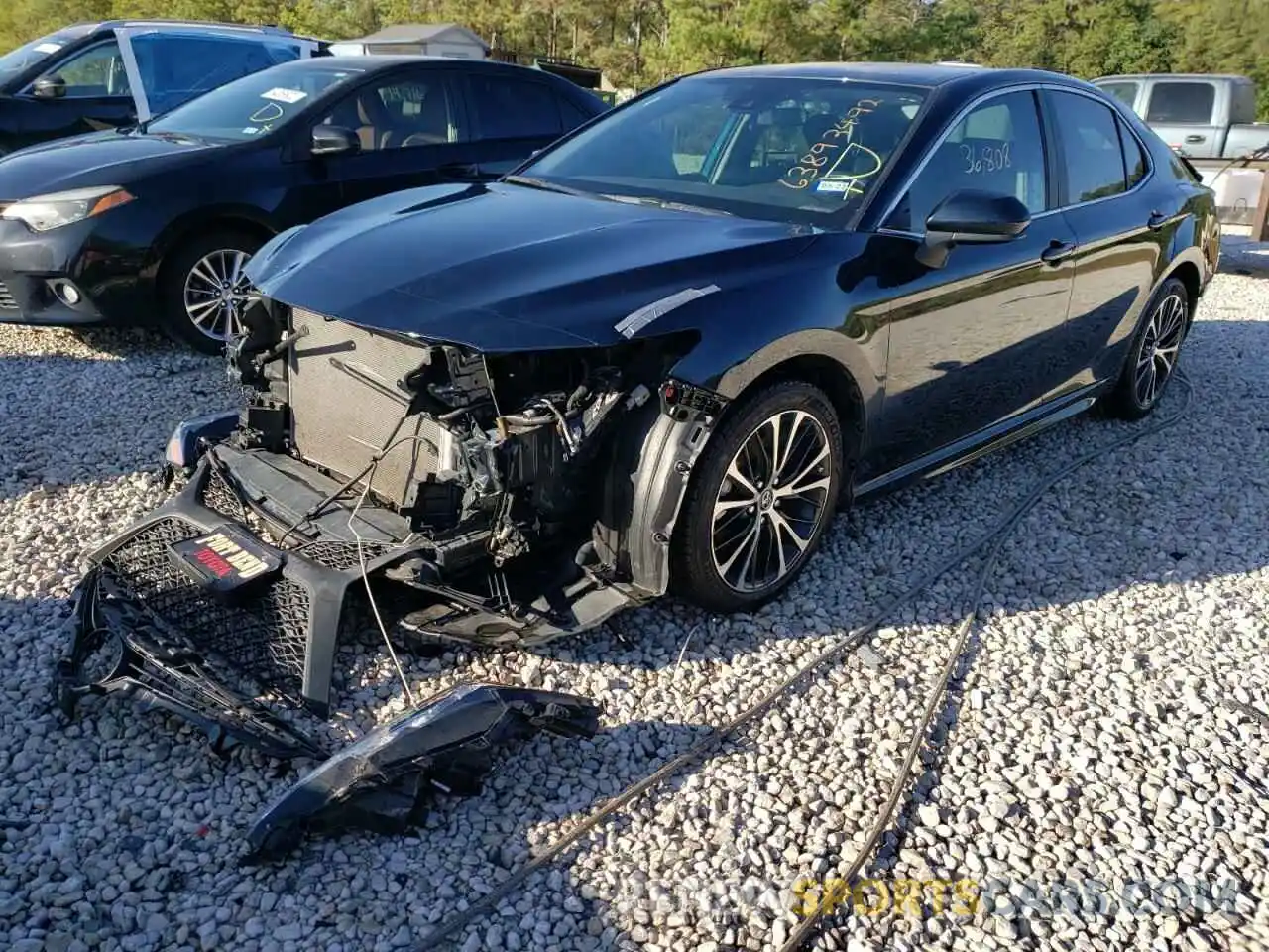 2 Photograph of a damaged car 4T1B11HK9KU753826 TOYOTA CAMRY 2019