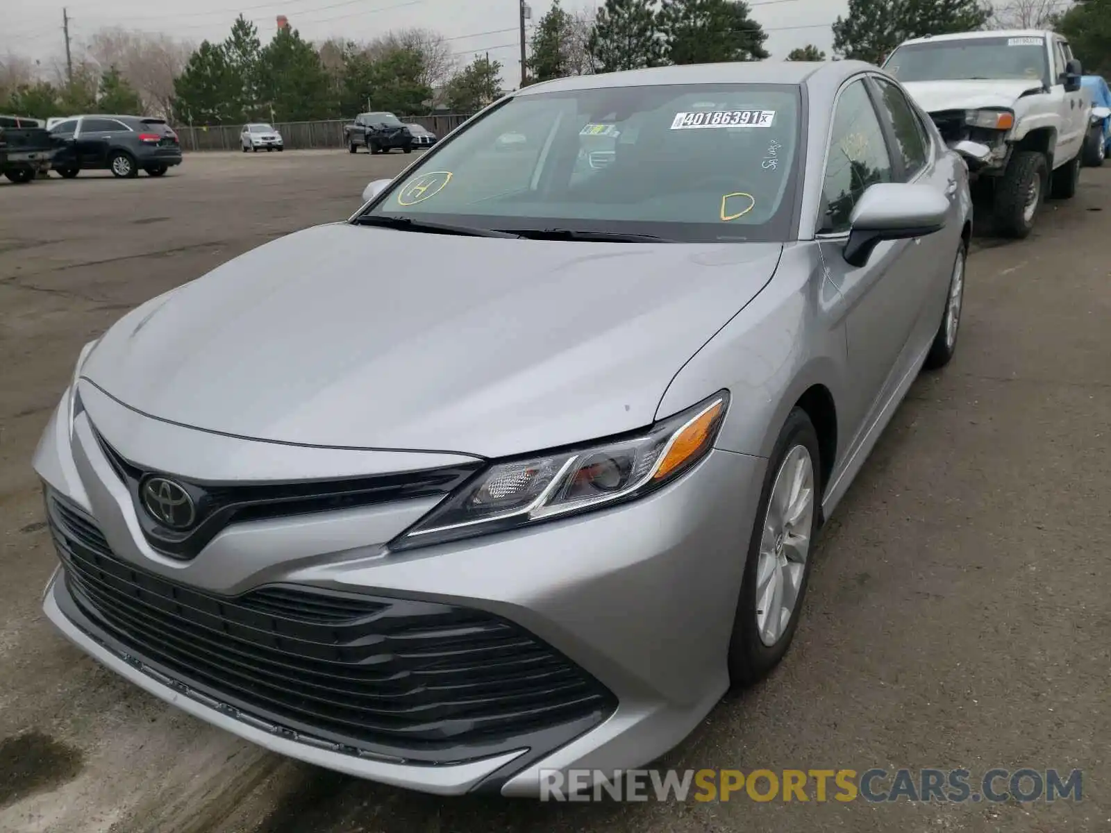 2 Photograph of a damaged car 4T1B11HK9KU759805 TOYOTA CAMRY 2019