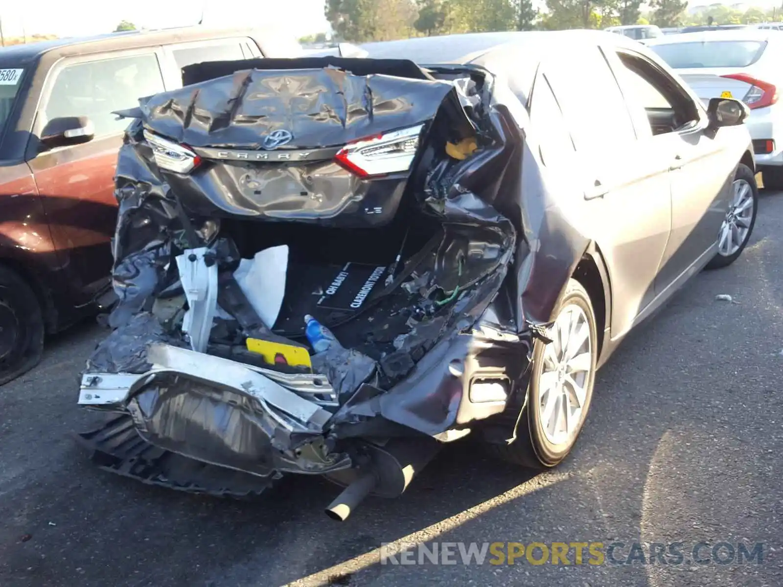 4 Photograph of a damaged car 4T1B11HK9KU778919 TOYOTA CAMRY 2019